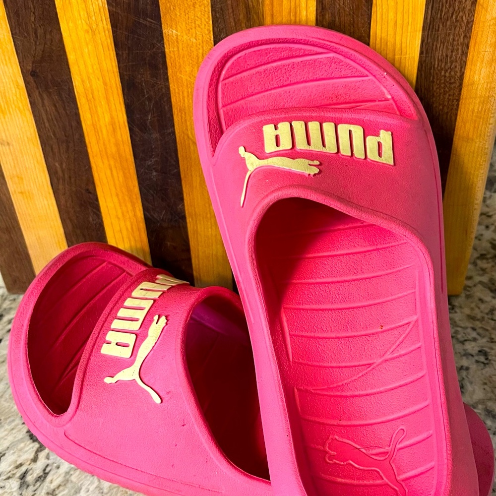 Pink Puma slides, size 6